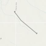 Gray diagonal line with arrowheads at both ends crossing a rural map from near Pierce Ave to the southeast across 350th St; indicates a route or path on the map, with an elevation marker of 1471 ft nearby.