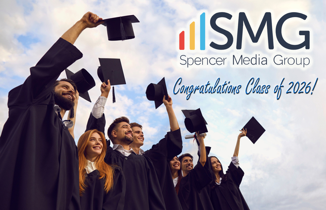 Group of graduates in caps and gowns cheering, with ISMG Spencer Media Group logo and 'Congratulations Class of 2026!' text in the sky.
