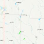Map of a rural Iowa region with blue and green route segments near Mallard, showing Ruthven and Emmetsburg along with roads and a red vertical highway line