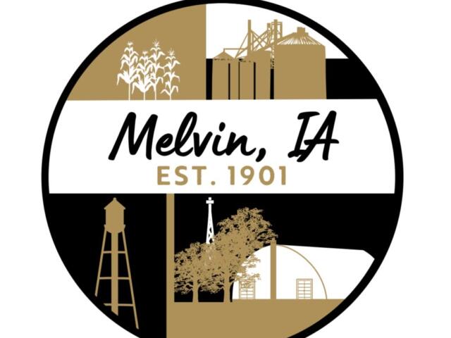 Melvin, IA town seal with crops, silos, water tower, and buildings, EST. 1901.