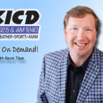 Promotional banner for KICK radio featuring a smiling man in a blue checkered blazer with text 'News On Demand! with Kevin Tlam' on a blue gradient background.