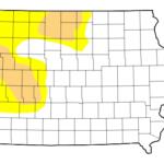 Western Iowa drought map: yellow and tan patches indicate drought-affected counties in the western region of the state.